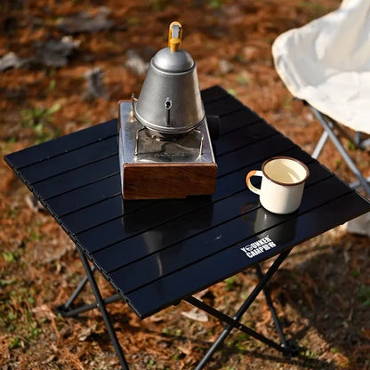 table de camping pliante légère avec bouilloire et tasse